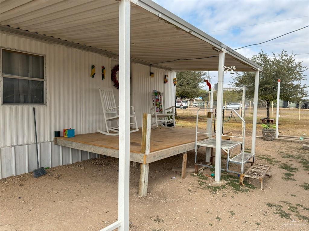 39817 Mile 4 Road Penitas, TX 78576 - Photo 10 of 19 a view of a room with table and chairs
