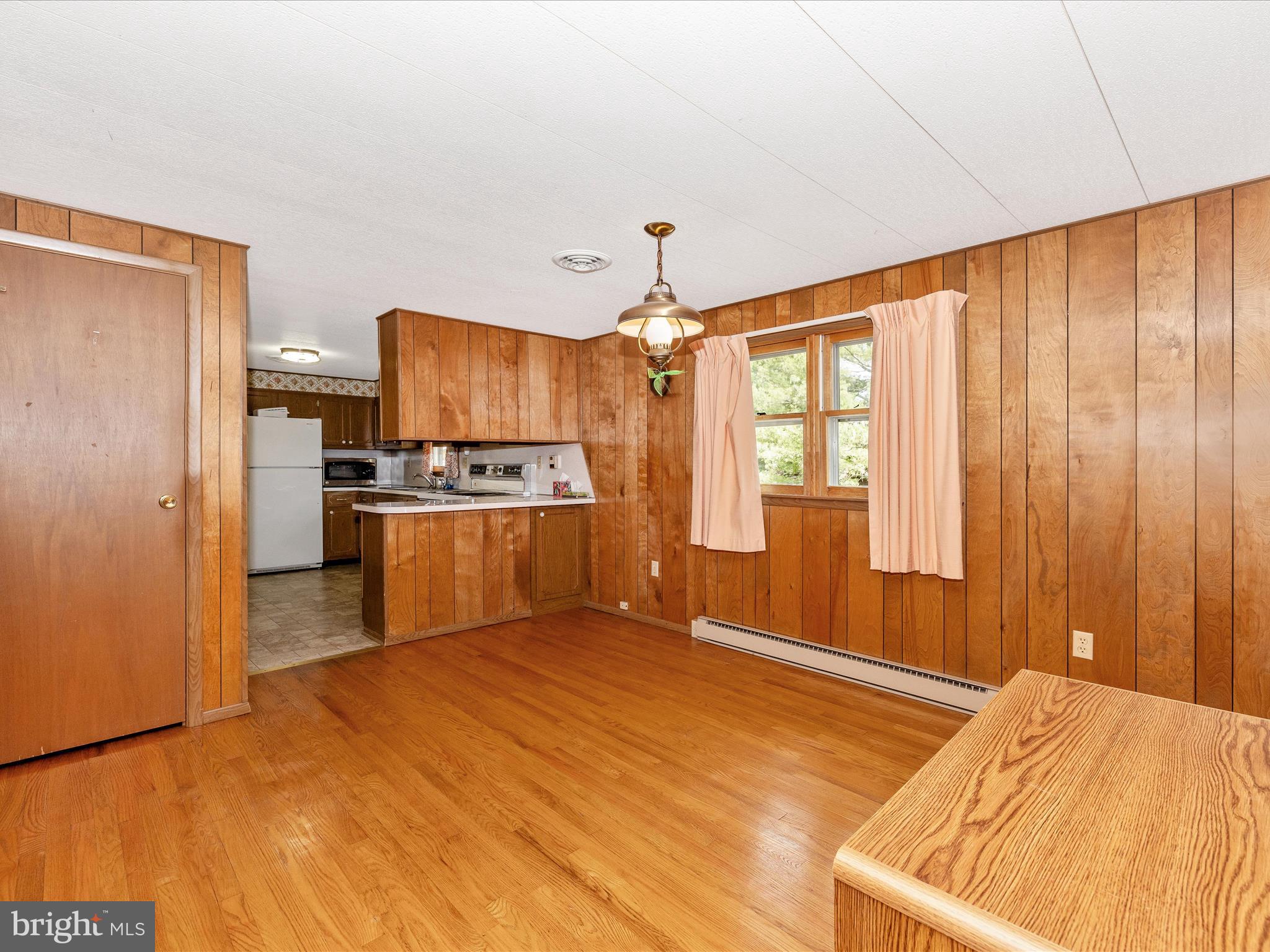 6 Schaller Lane Smithsburg, MD 21783 - Photo 11 of 61 a kitchen with stainless steel appliances kitchen island granite countertop a refrigerator and a stove top oven