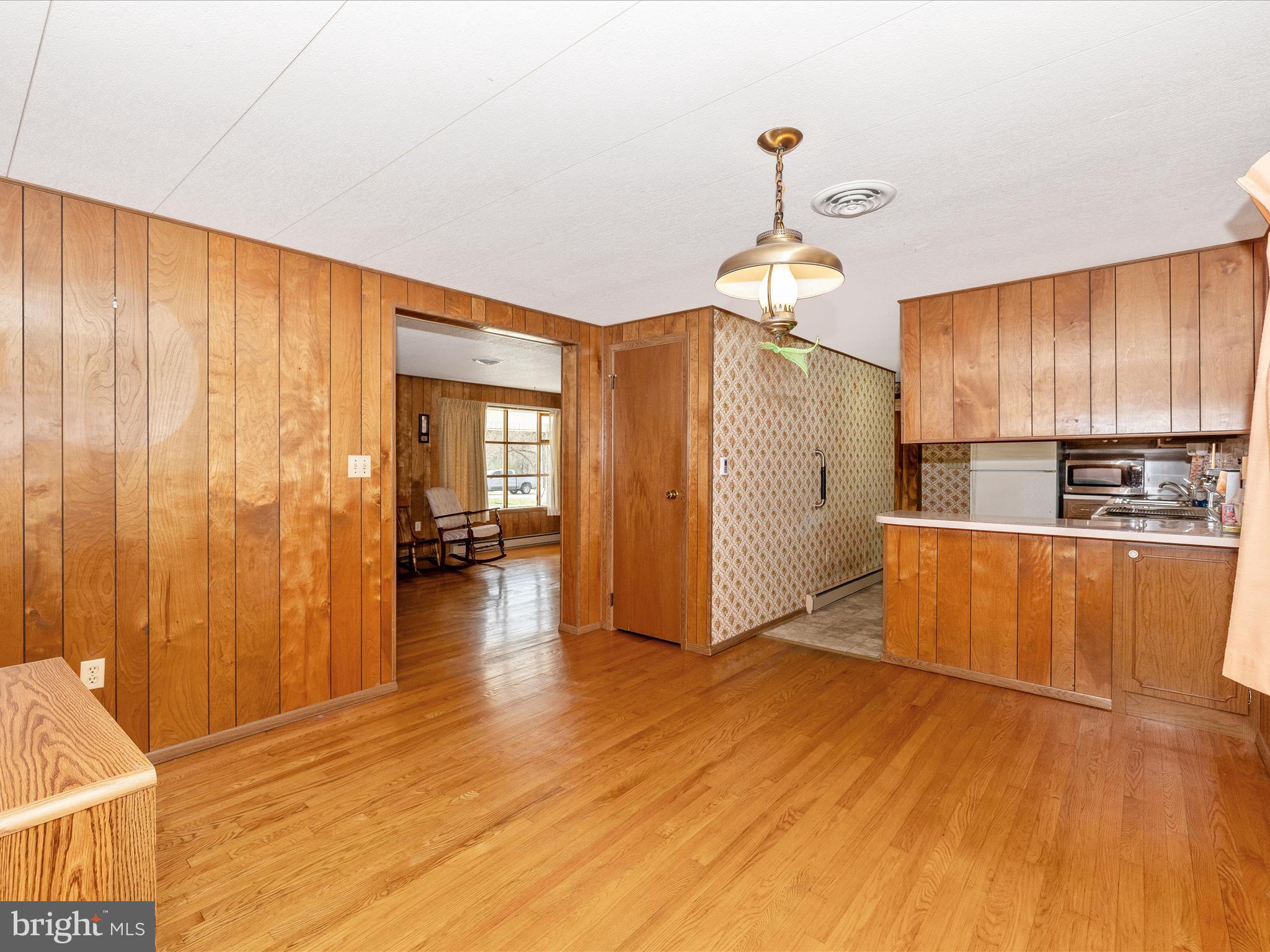 6 Schaller Lane Smithsburg, MD 21783 - Photo 12 of 61 a view of a kitchen with wooden floor and a kitchen