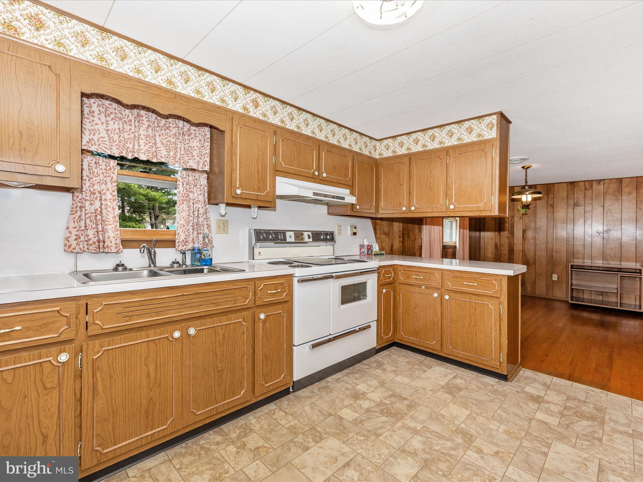 6 Schaller Lane Smithsburg, MD 21783 - Photo 18 of 61 a kitchen with sink cabinets and window