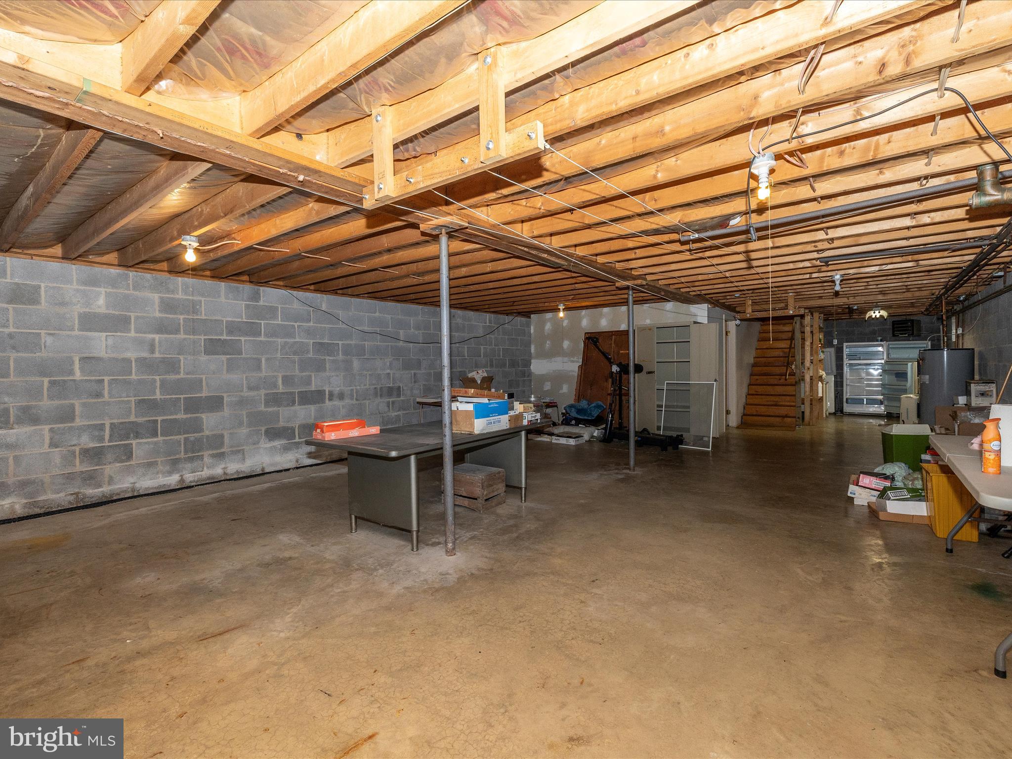6 Schaller Lane Smithsburg, MD 21783 - Photo 40 of 61 a view of a big room with air conditioner duct and materials on the wall