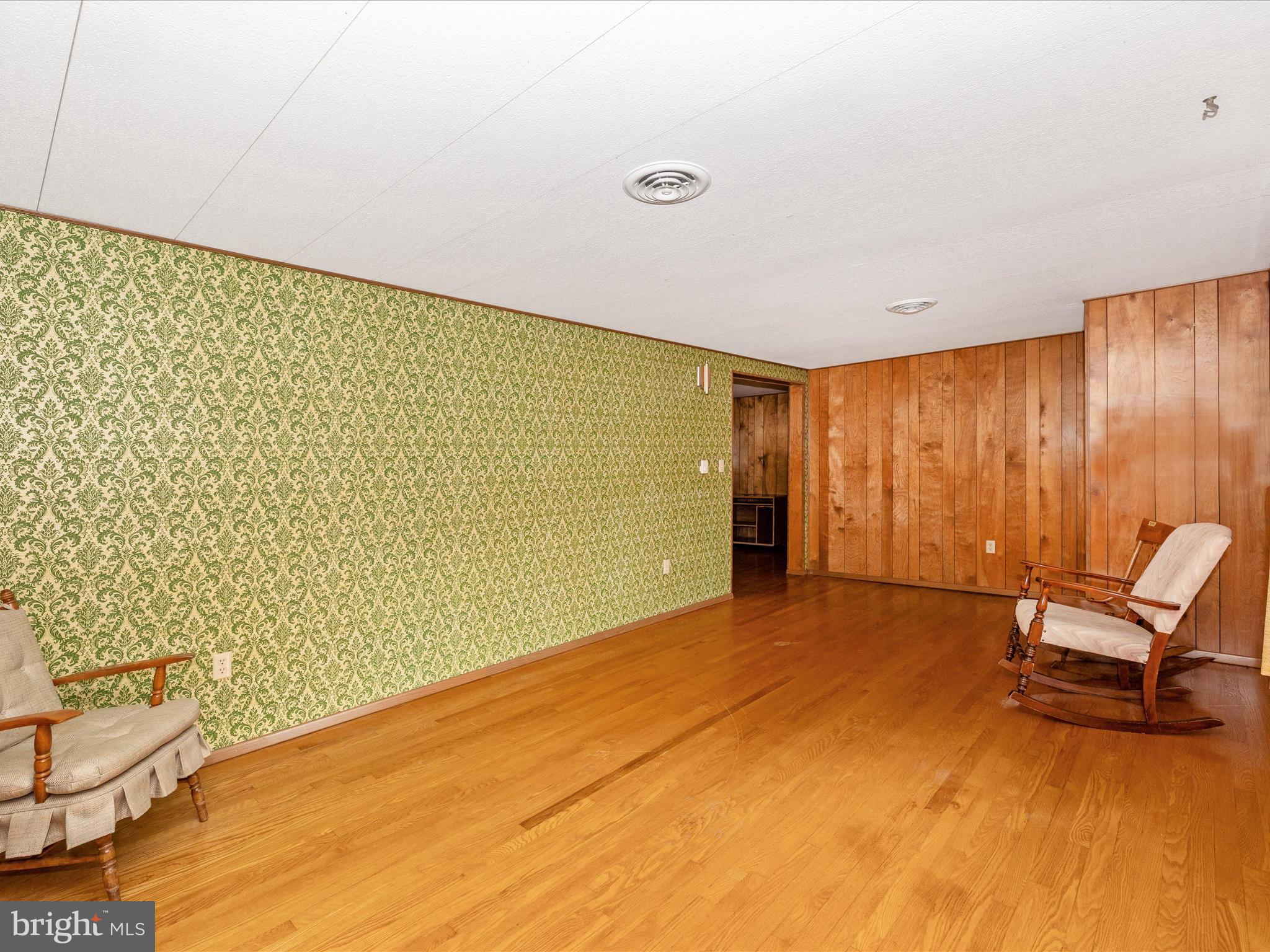 6 Schaller Lane Smithsburg, MD 21783 - Photo 6 of 61 a view of a room with gym equipment and a window