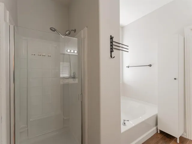 a bathroom with a bath tub