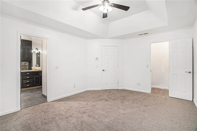 an empty room with a bathroom