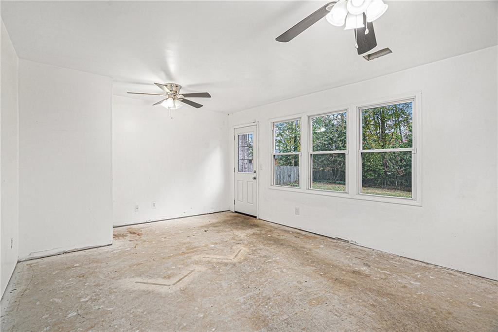 4208 Mistymorn Point Powder Springs, GA 30127 - Photo 22 of 28 an empty room with windows and fan
