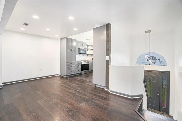 a view of kitchen and windows