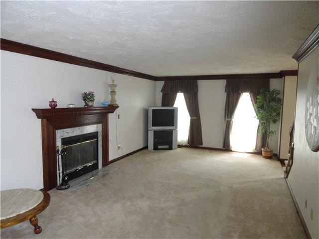 511 Tyler Ct Road Cottontown, TN 37048 - Photo 8 of 16 Large living room with wood burning fireplace