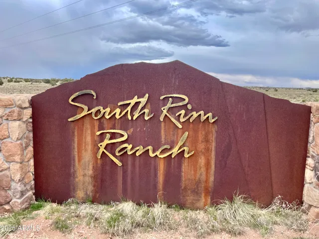 a sign that is on the wall of the building