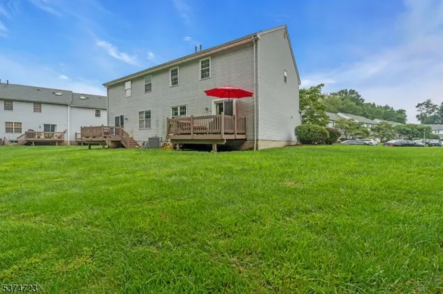 a view of a house with backyard