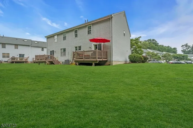a view of a back yard of the house