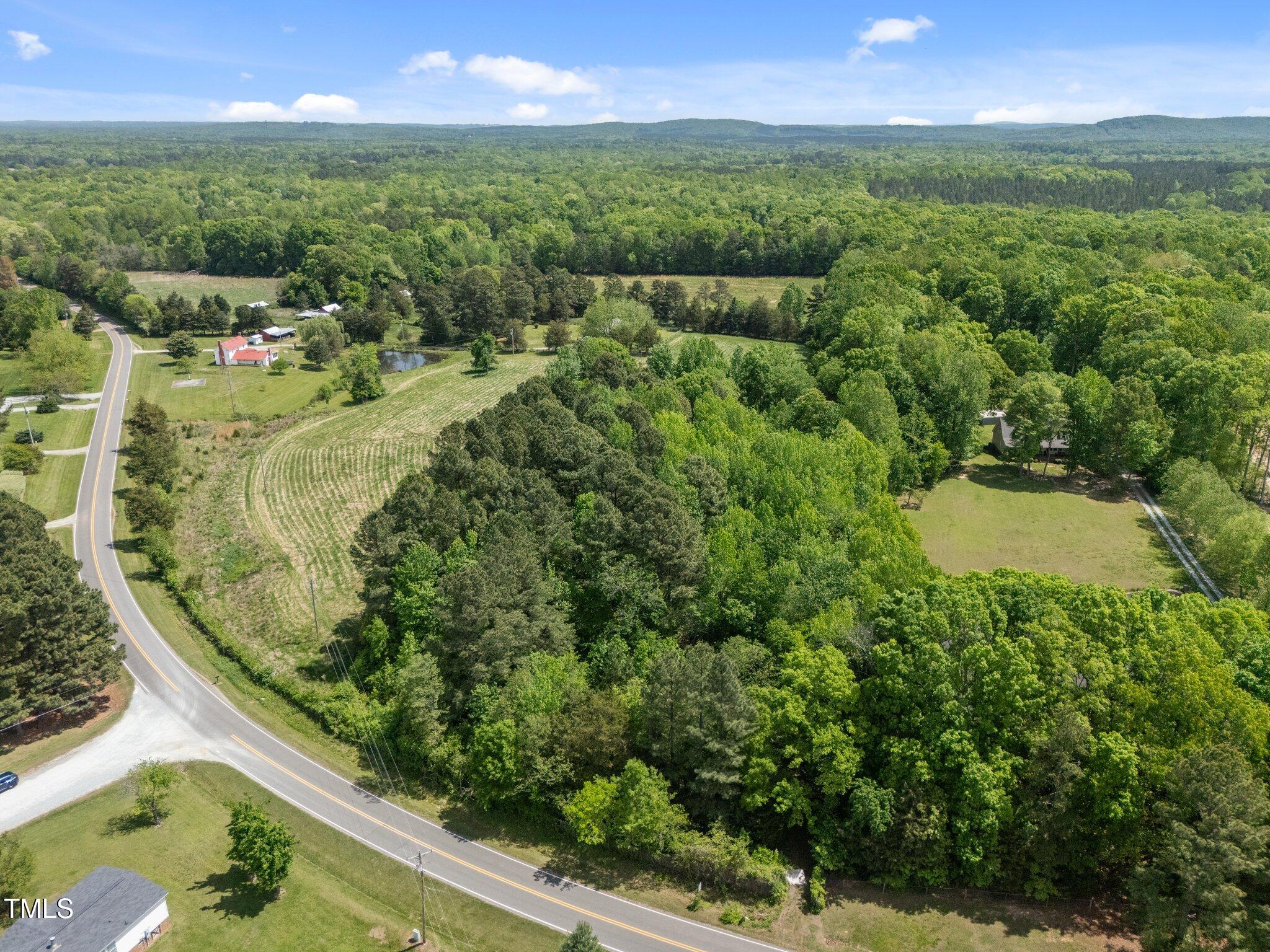 1595 Ned Moore Road Timberlake, NC 27583 - Photo 2 of 14 2-web-or-mls-DJI_20250423121932_0032_D