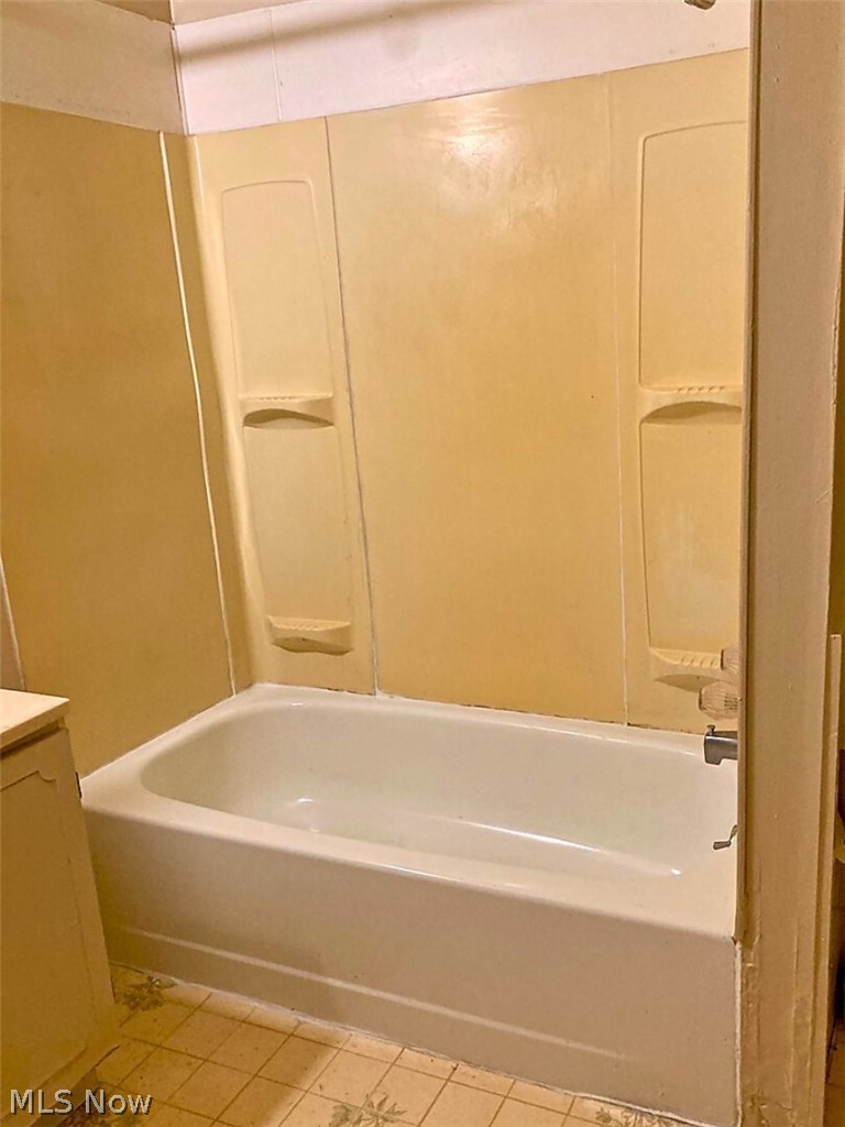 554 Eddy Road Cleveland, OH 44108 - Photo 26 of 32 Full bath with shower / tub combination and tile patterned floors