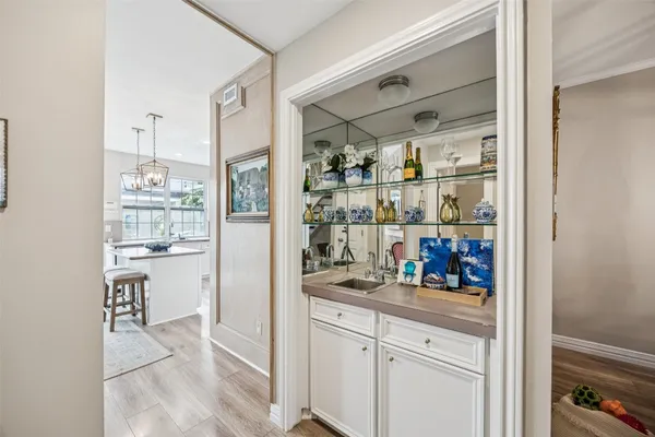 a kitchen with stainless steel appliances a refrigerator and cabinets