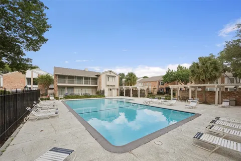 swimming pool view with a outdoor space