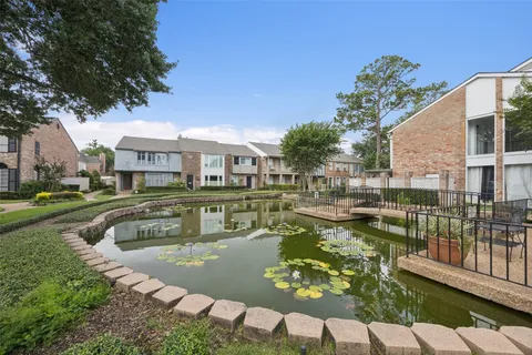 a view of a house with swimming pool