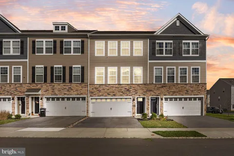 a picture of a bathroom with a shower