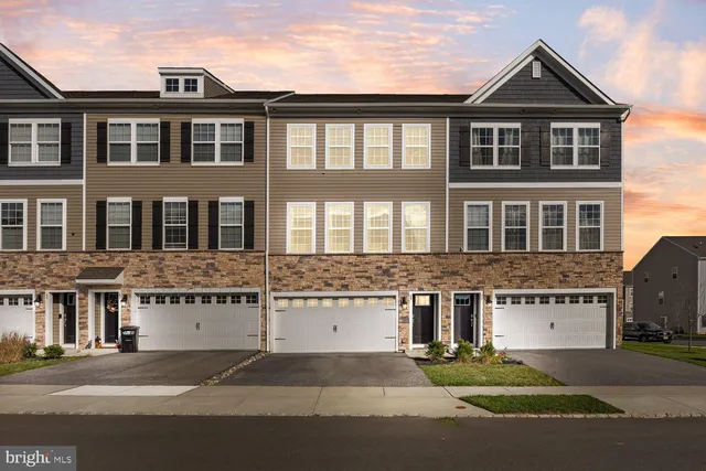 a picture of a bathroom with a shower