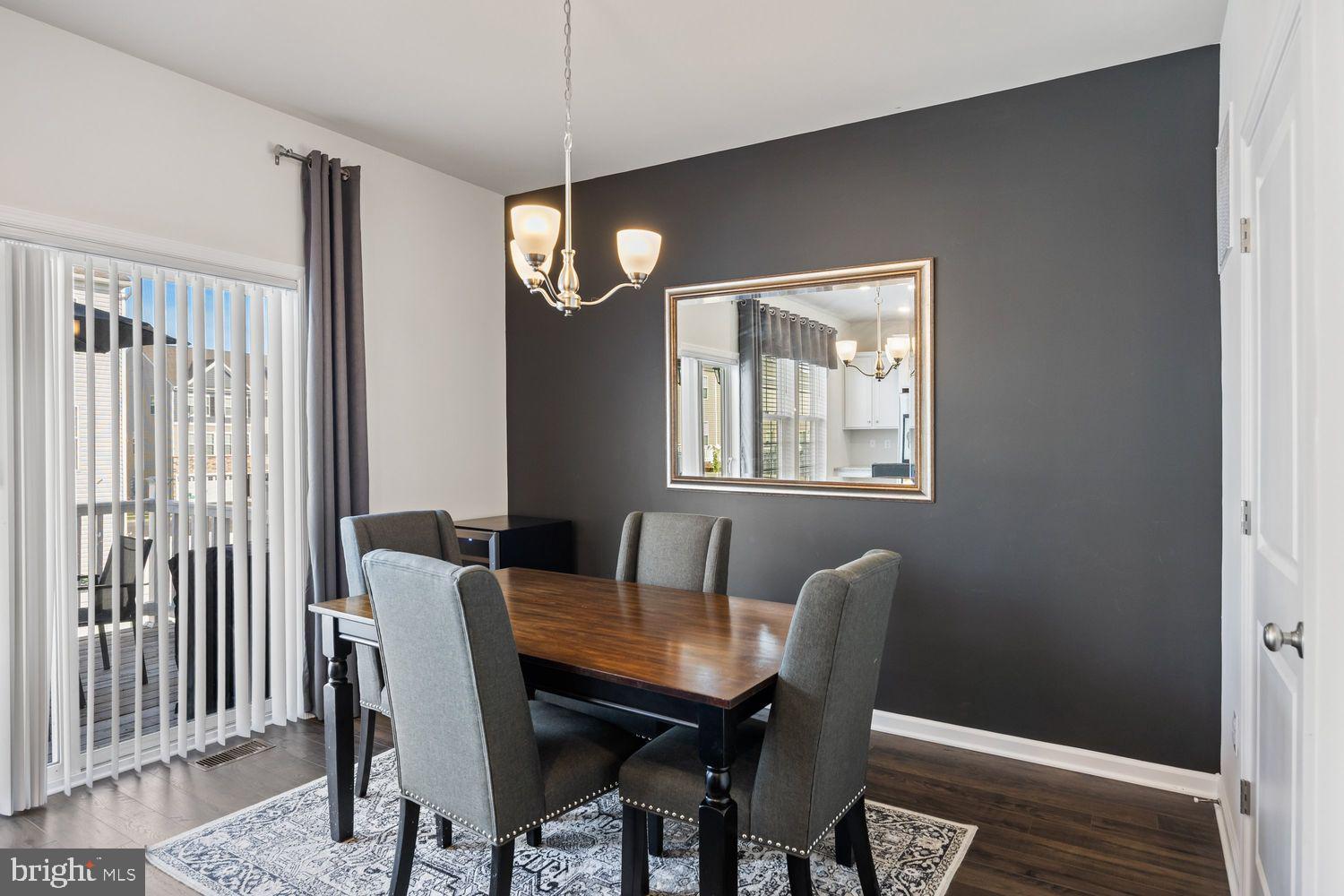 69 Sister's Farmstead Rd Mount Mount Laurel, NJ 08054 - Photo 15 of 44 a view of a dining room with furniture window and wooden floor