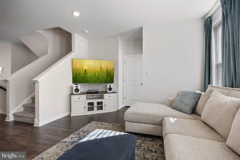 a living room with furniture and a couch