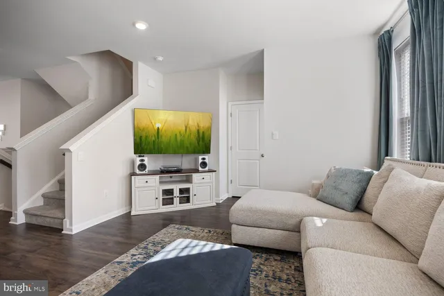 a living room with furniture and a couch