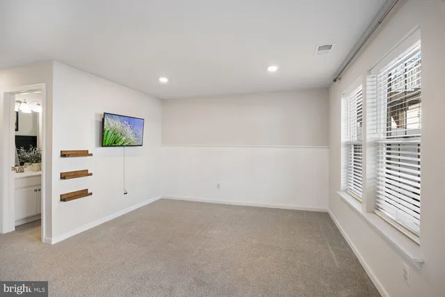 a view of entryway with stairs and furniture