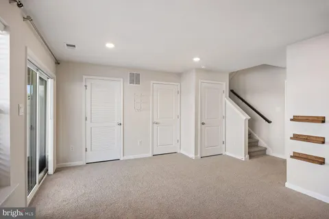 a view of house with backyard