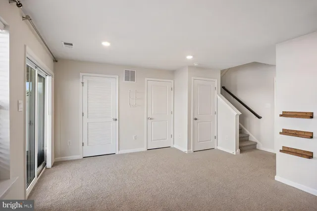 a view of house with backyard