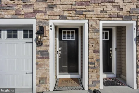 a view of bathroom with a mirror