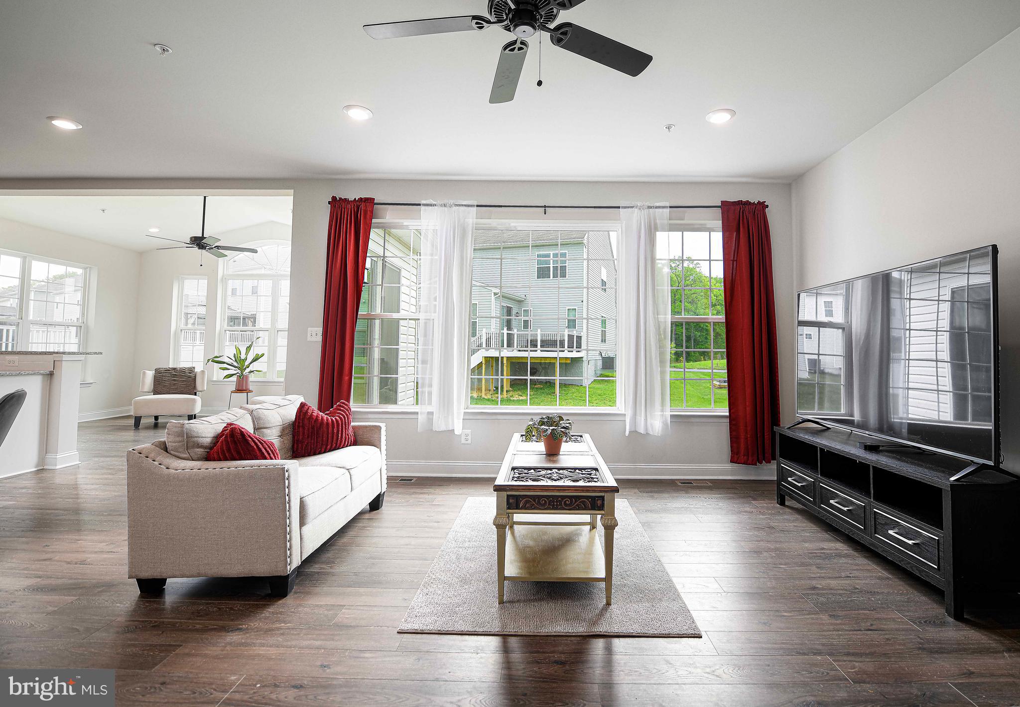 1218 Up And Over Lane Aberdeen, MD 21001 - Photo 13 of 40 a living room with furniture and floor to ceiling windows