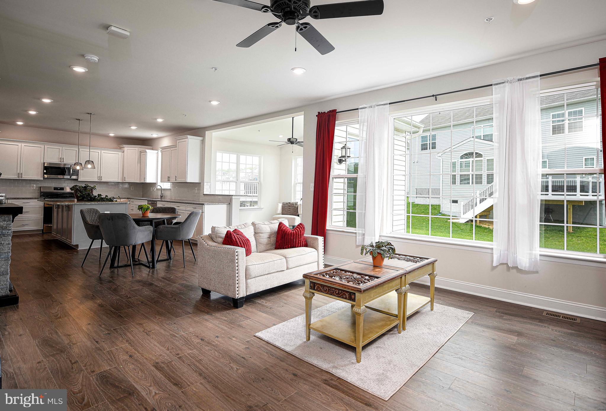 1218 Up And Over Lane Aberdeen, MD 21001 - Photo 14 of 40 a living room with furniture and a large window