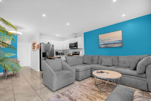 a living room with furniture and a couch