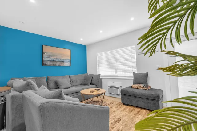 a living room with a couch and a couch