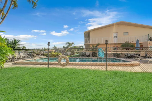 a view of a terrace with yard