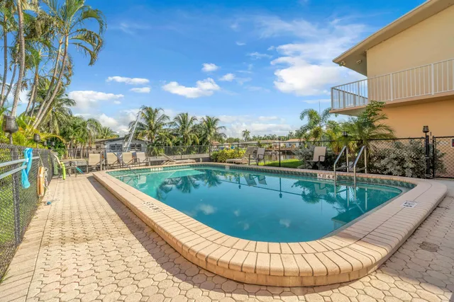 a view of a swimming pool with a fountain