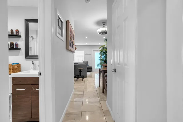 a bathroom with a sink and mirror