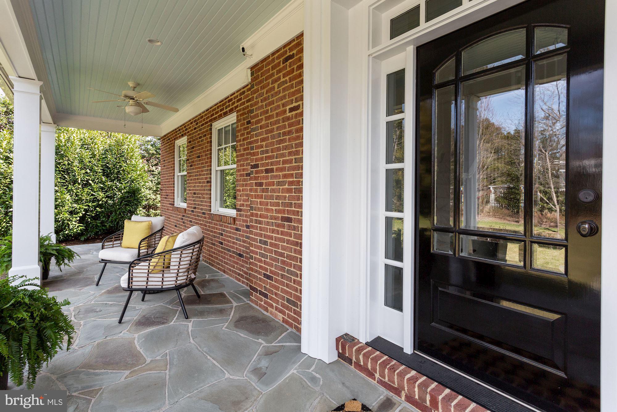 7722 Greentree Road Bethesda, MD 20817 - Photo 11 of 66 deep front porch, seating area on slate porch