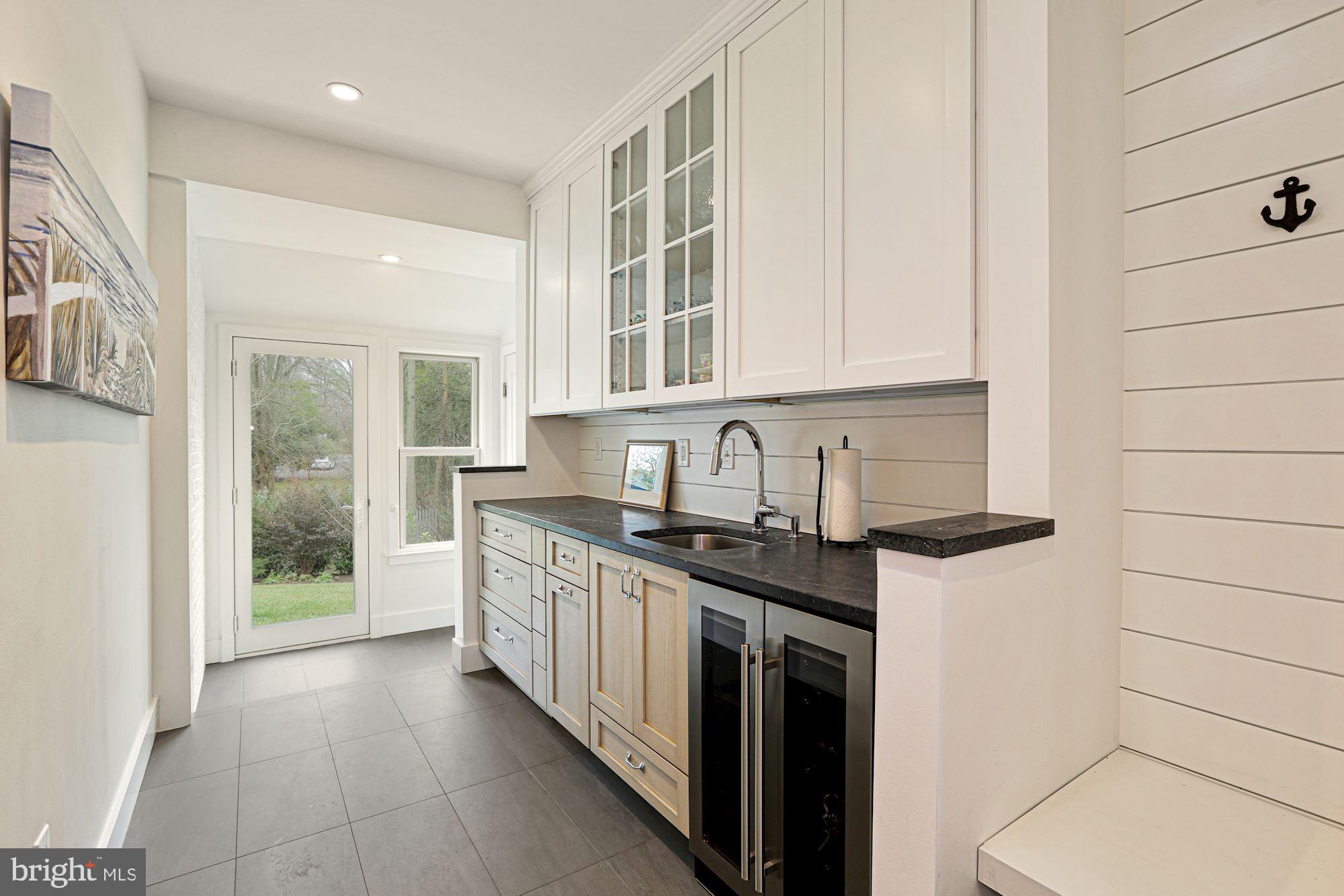 7722 Greentree Road Bethesda, MD 20817 - Photo 16 of 66 shiplap w/ bench ,glass cabinets,beverage center