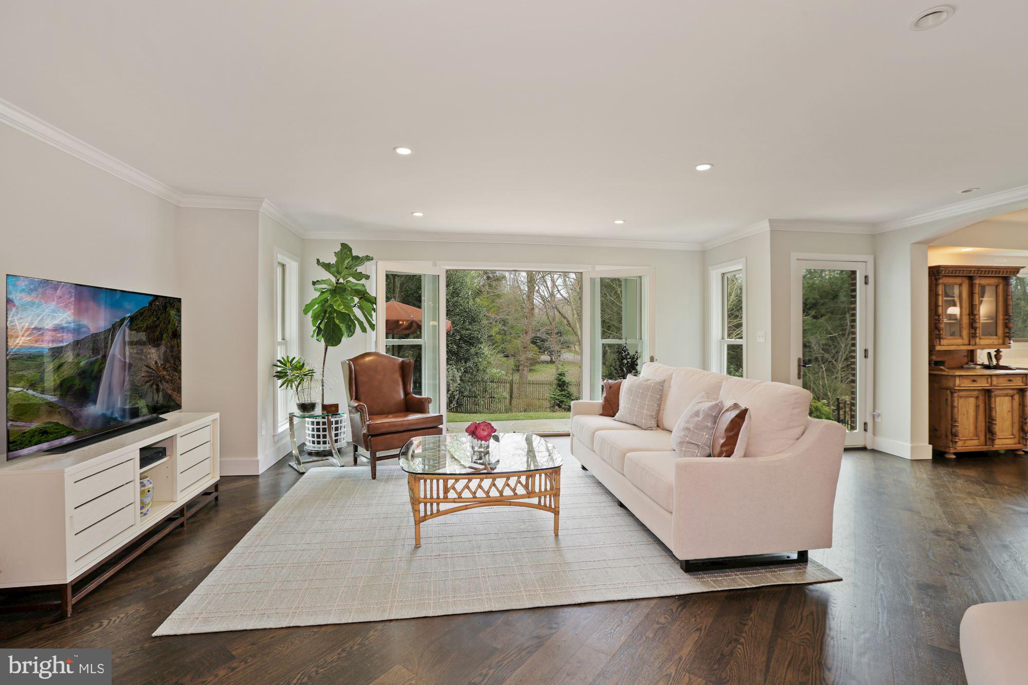 7722 Greentree Road Bethesda, MD 20817 - Photo 3 of 66 family rm french doors to patio & 2nd patio door