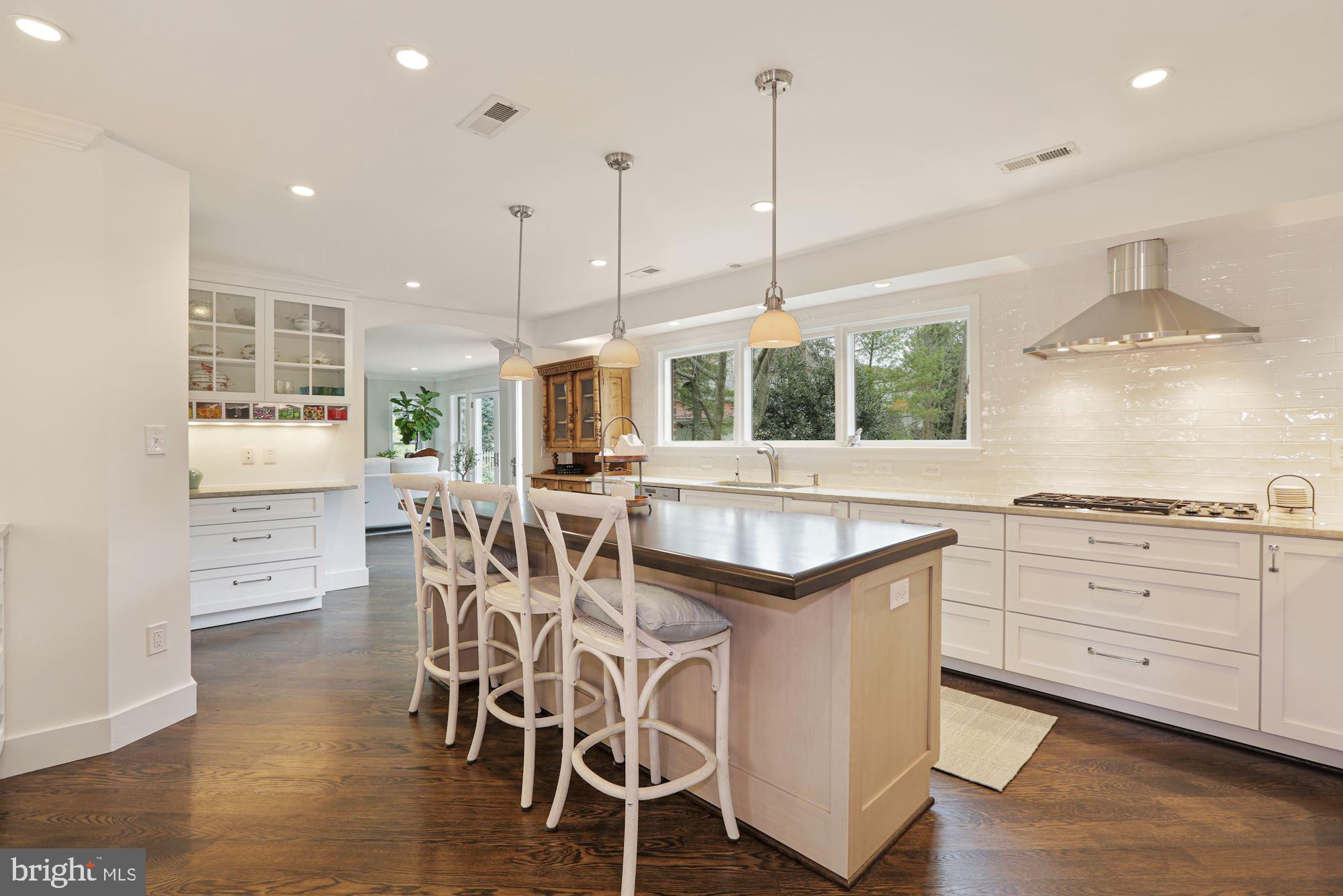 7722 Greentree Road Bethesda, MD 20817 - Photo 4 of 66 candy bar, large island, light filled kitchen