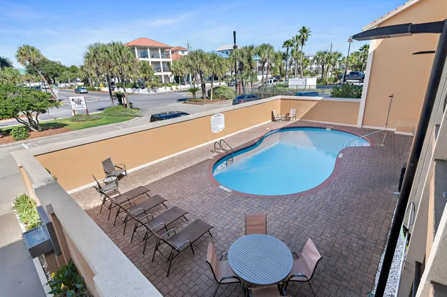 swimming pool view with a seating space and sitting space