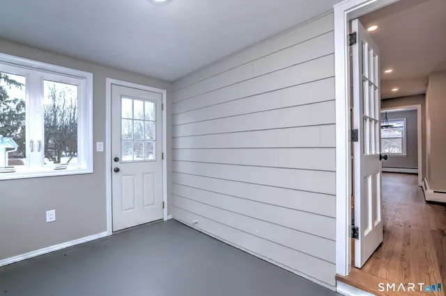 a view of an empty room and window