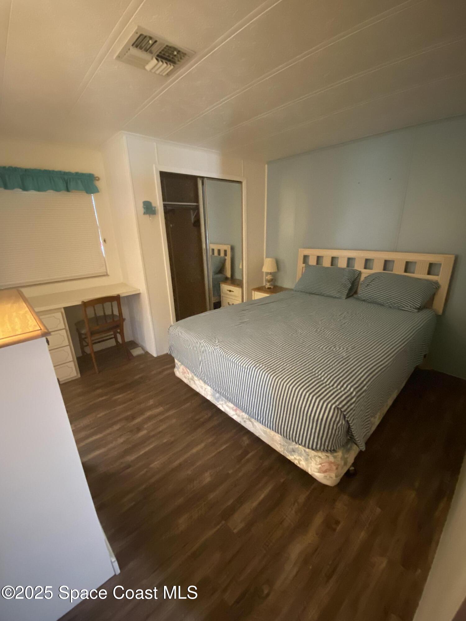 1906 Mango Street Northeast Palm Bay, FL 32905 - Photo 19 of 42 a living room with a couch