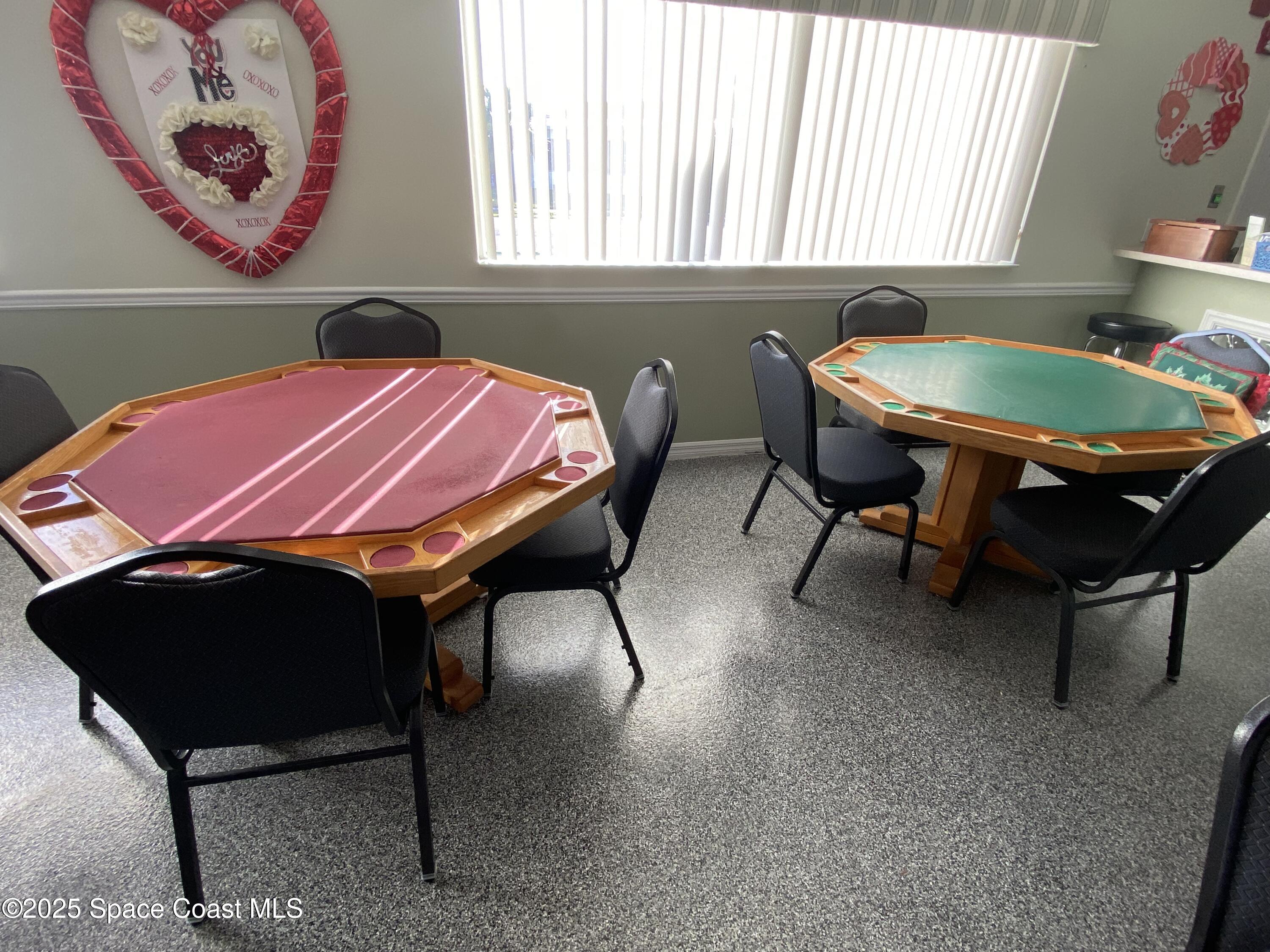 1906 Mango Street Northeast Palm Bay, FL 32905 - Photo 28 of 42 a view of a dining room with furniture and window