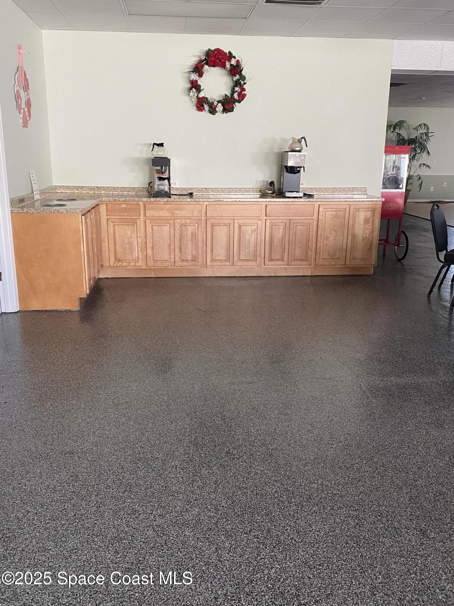 1906 Mango Street Northeast Palm Bay, FL 32905 - Photo 30 of 42 a living room with furniture and a window