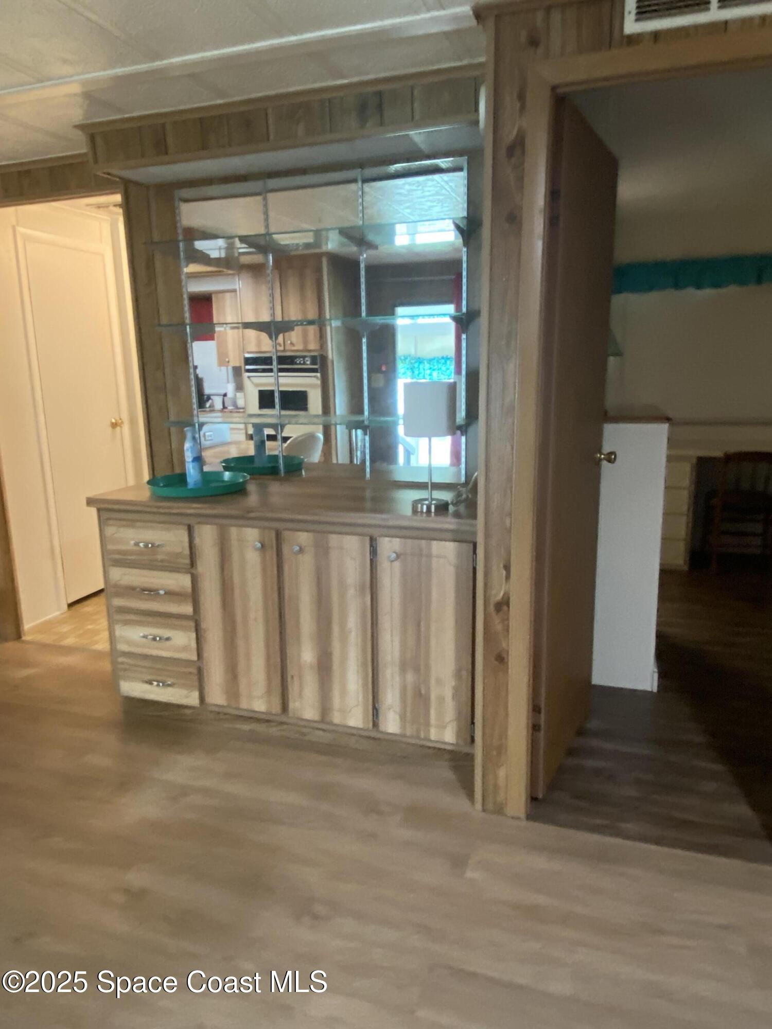 1906 Mango Street Northeast Palm Bay, FL 32905 - Photo 7 of 42 a view of a door and outdoor space