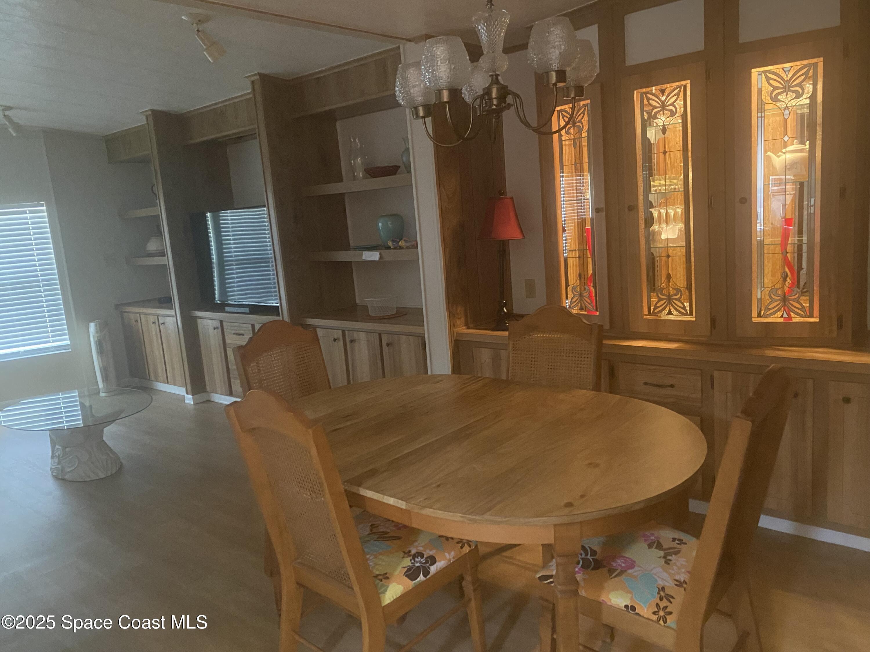 1906 Mango Street Northeast Palm Bay, FL 32905 - Photo 9 of 42 a bathroom with a tub and a sink