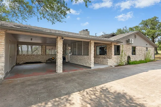 a view of a house with a patio