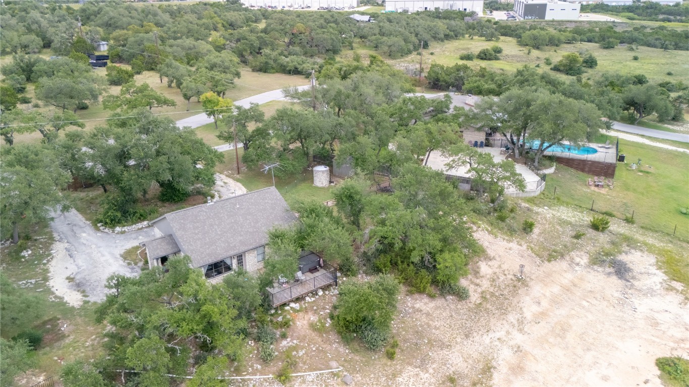 110 Longhorn Lane Dripping Springs, TX 78620 - Photo 39 of 40 an aerial view of a house with a yard