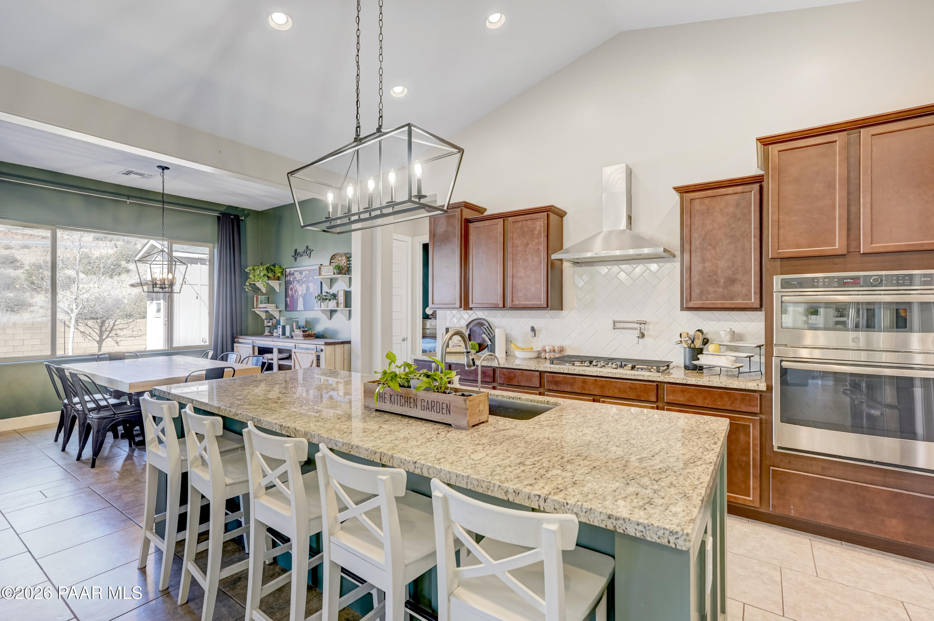 2032 Summer View Drive Prescott, AZ 86301 - Photo 4 of 17 a kitchen with stainless steel appliances granite countertop a sink and a stove