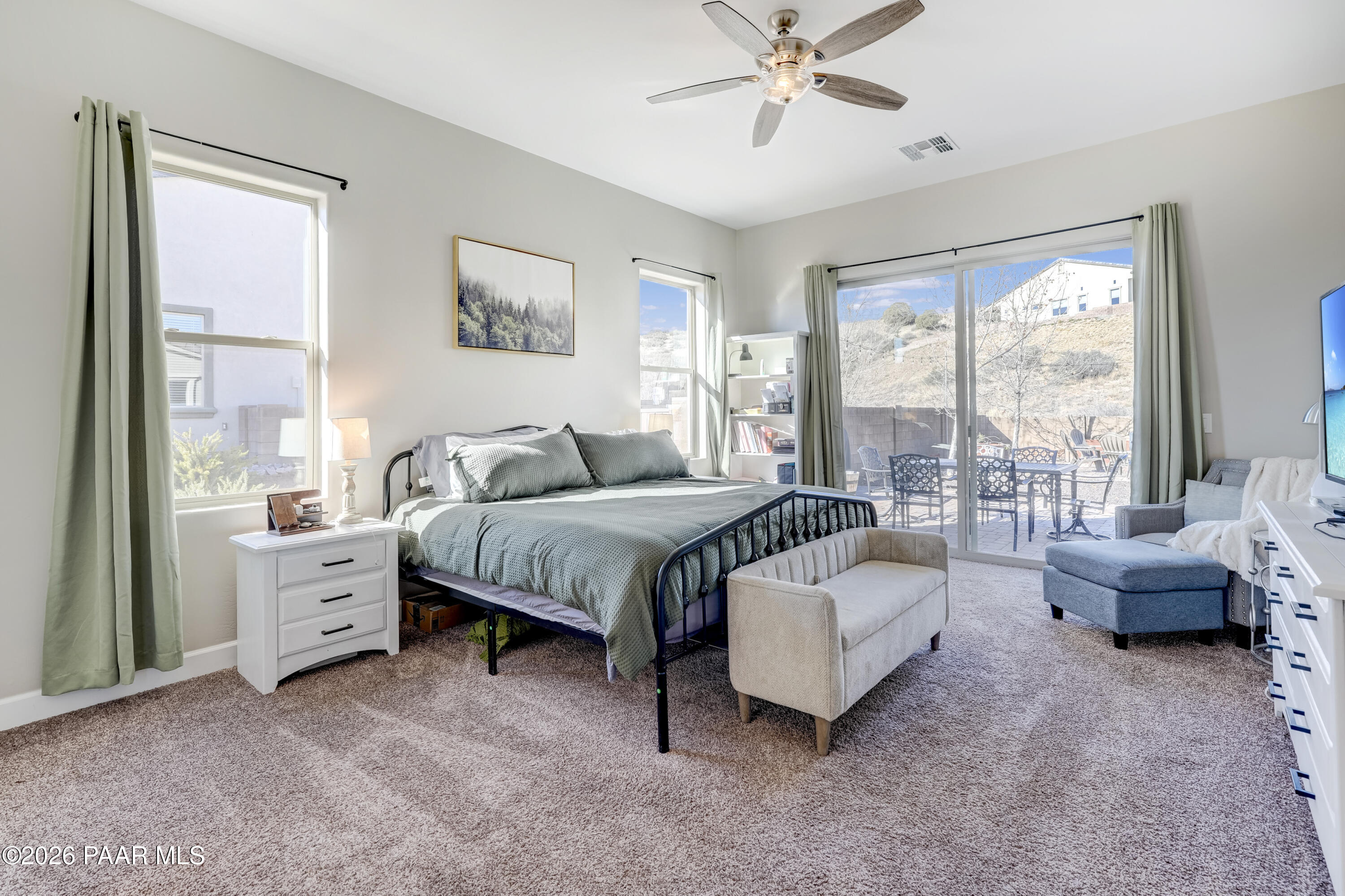 2032 Summer View Drive Prescott, AZ 86301 - Photo 6 of 17 a spacious bedroom with a bed and a large window